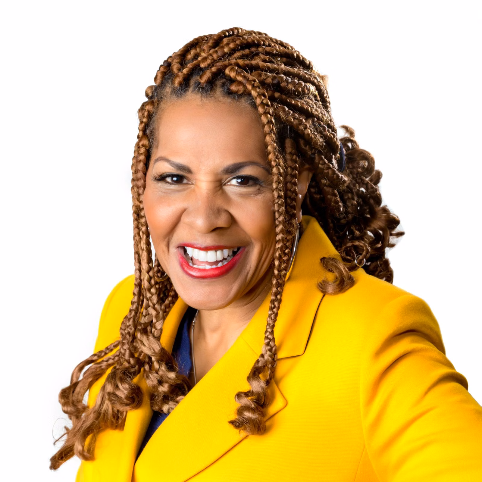 Corporate headshot example on a neutral backdrop